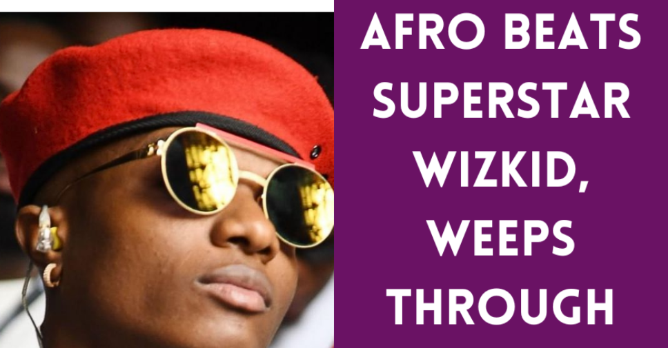 Image featuring Wizkid mourning the loss of his mother.