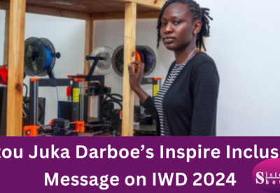Image of Fatou Juka Darboe delivering a message on International Women