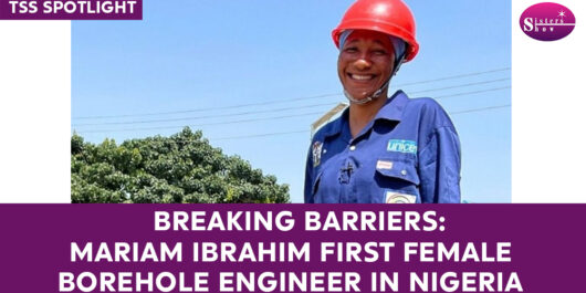 Image of Mariam Ibrahim, the first female borehole engineer in Nigeria, inspecting a borehole.